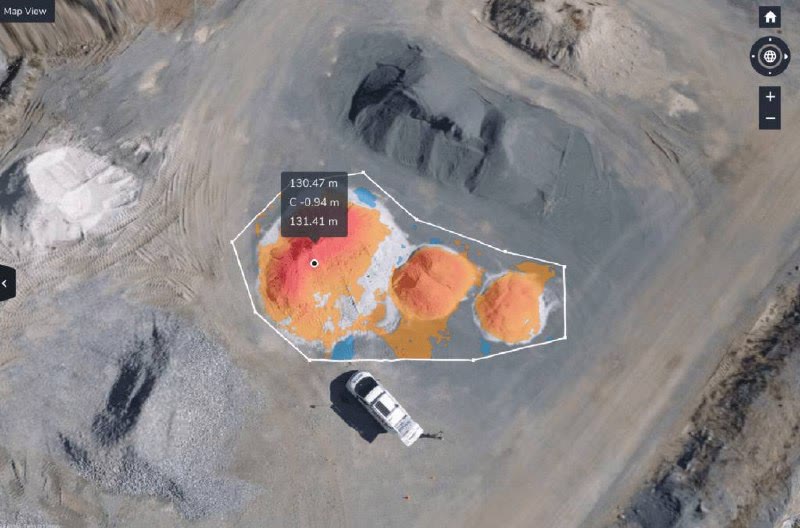 Aerial stockpile volumetric measurement